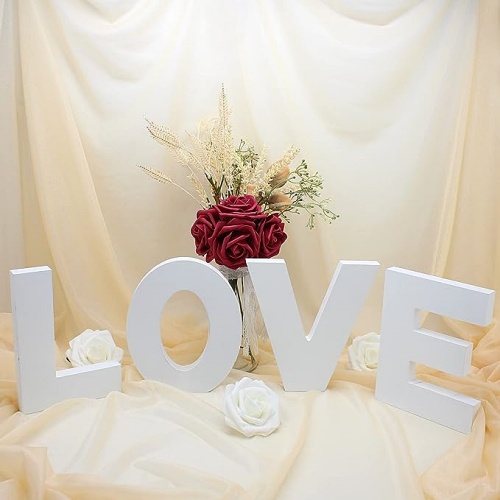 White wooden letters love wedding design for perfect and romantic decoration of the wedding tables
