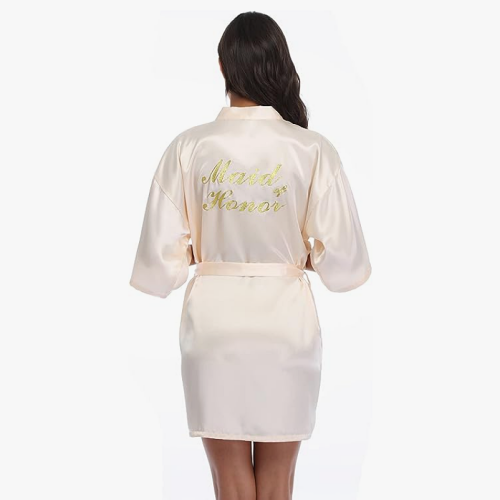 Bachelorette silk robes Selection of pleasant satin robes with glittering gold inscriptions for the bride & bridesmaids