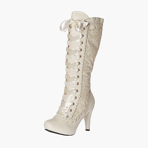 Victorian lace white boots with lace patterns and a high...