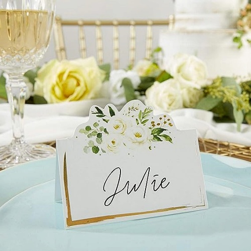 Unique wedding seating place cards in a romantic design with White roses and a royal gold foil frame