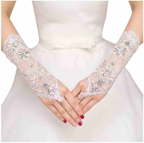Lace wedding gloves fingerless Wow how beautiful they are Stunning lace gloves woven with crystals to create a majestic, sparkling and luxurious look