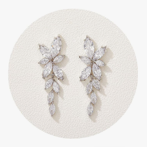 Crystal drop earrings bridal in a charming and sparkling leaf design intertwined with spectacular crystals that will give light to your face