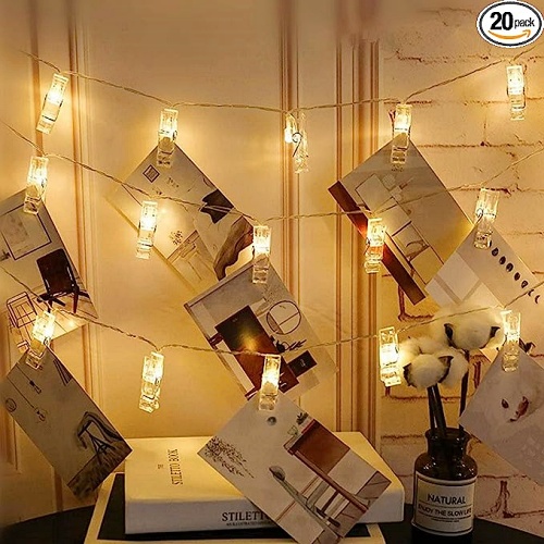 Led photo clip string fairy lights Battery Operated String of Fairy Lights with Clips for Hanging Photos, Cards and More! Length: 3 meters with 20 light up clips