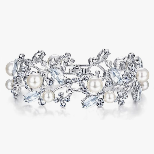 Crystal pearl bridal leaf bracelet in silver A stretchy and comfortable tennis bracelet in a particularly impressive metallic style interwoven with sparkling crystals – Comes in rose gold / gold or silver