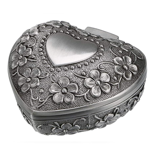 Metal vintage heart shaped jewelry box in a fascinating vintage...