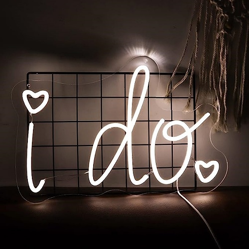Neon sign for wedding reception Letter sign glowing with magical LED lights with the inscription “I DO” to create a particularly romantic and magical atmosphere