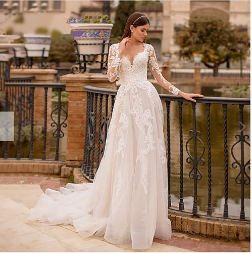 V neck lace sleeve wedding dress One of the most...