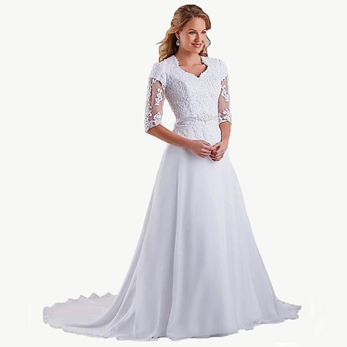 Modest wedding dress chiffon in an elegant style with romantic lace sleeves, a sculpting cut and endless princess magic