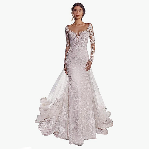 Long sleeve lace boho wedding dress A fitted mermaid style dress wraps the body in exquisite lace
